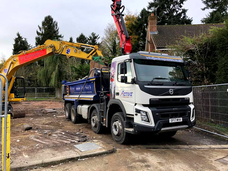 Active Grab Hire Truck performing groundwork